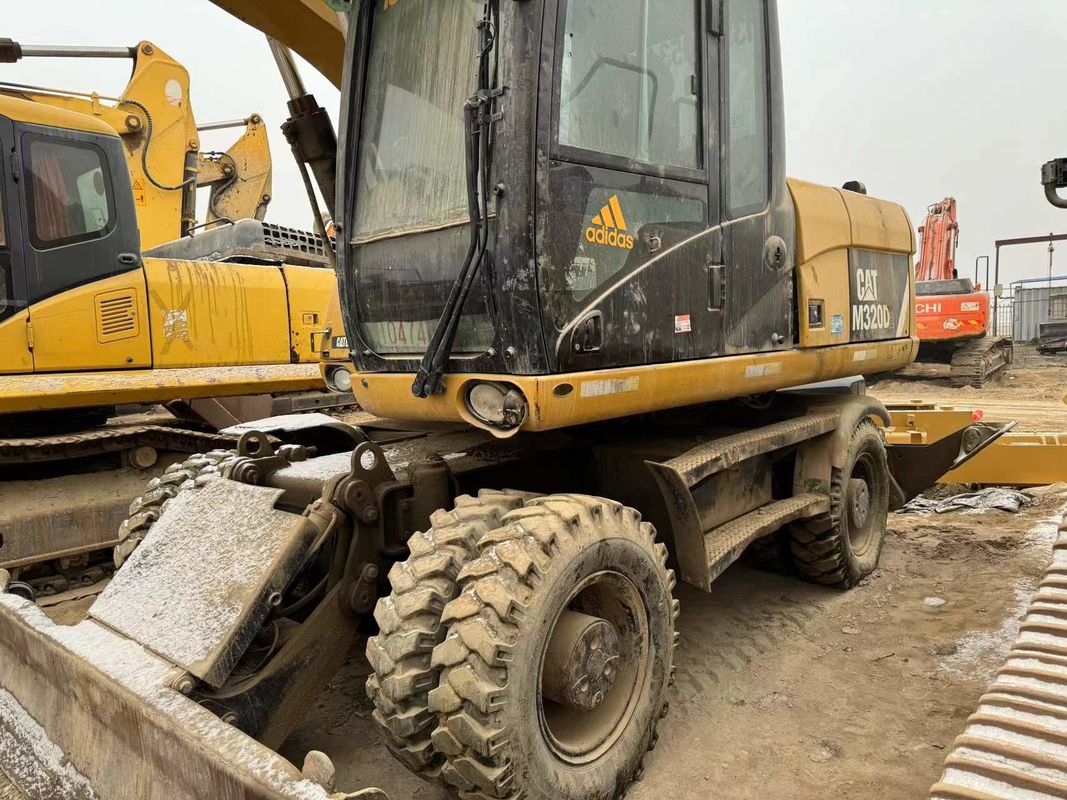 90% Caterpillar M317D2 Excavadora de rodas usadas com alta qualidade e melhor desempenho para venda