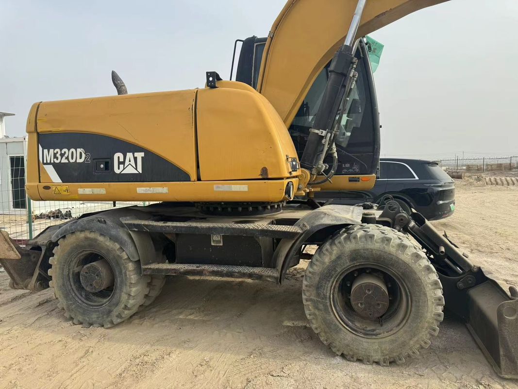 90% Caterpillar M317D2 Excavadora de rodas usadas com alta qualidade e melhor desempenho para venda