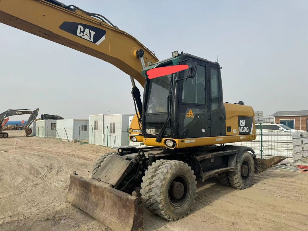 90% Caterpillar M317D2 Excavadora de rodas usadas com alta qualidade e melhor desempenho para venda