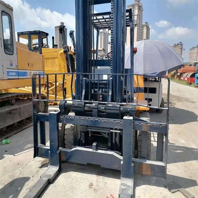 Forquilha diesel Komatsu FD70 de segunda mão fabricada no Japão com capacidade de carga de 7000 kg