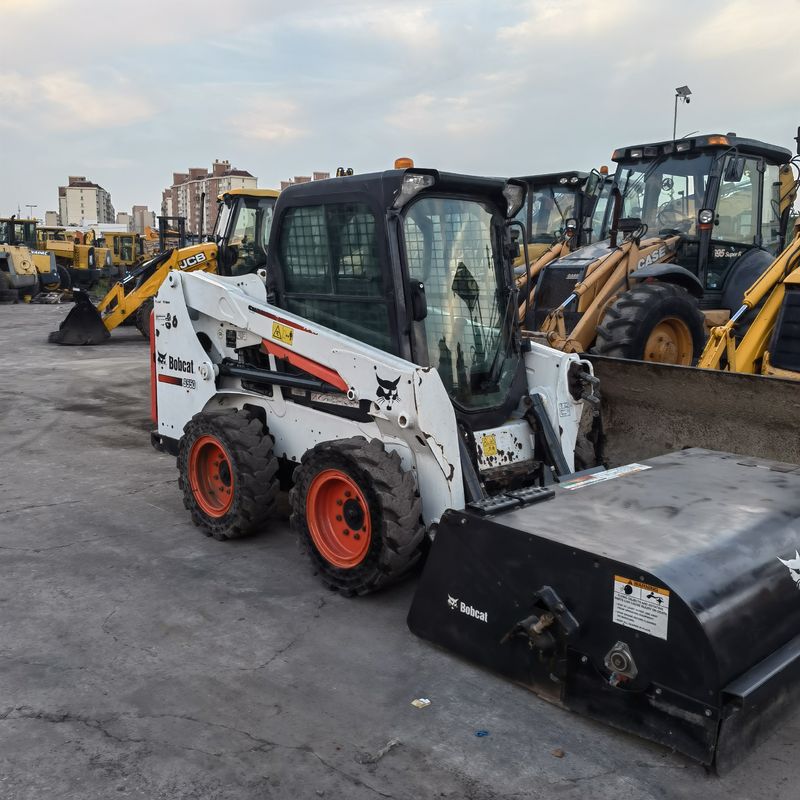 Carregador de roda movel de tipo deslizante-estribo BOCAT S550 Carregador usado para obras de construção